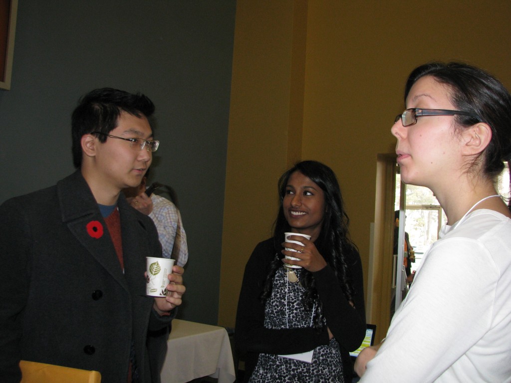 Bowdish lab members past (Charles Yin and Julie Kaiser) and present (Netusha Thevaranjan) catche up at IIRF 2014. 